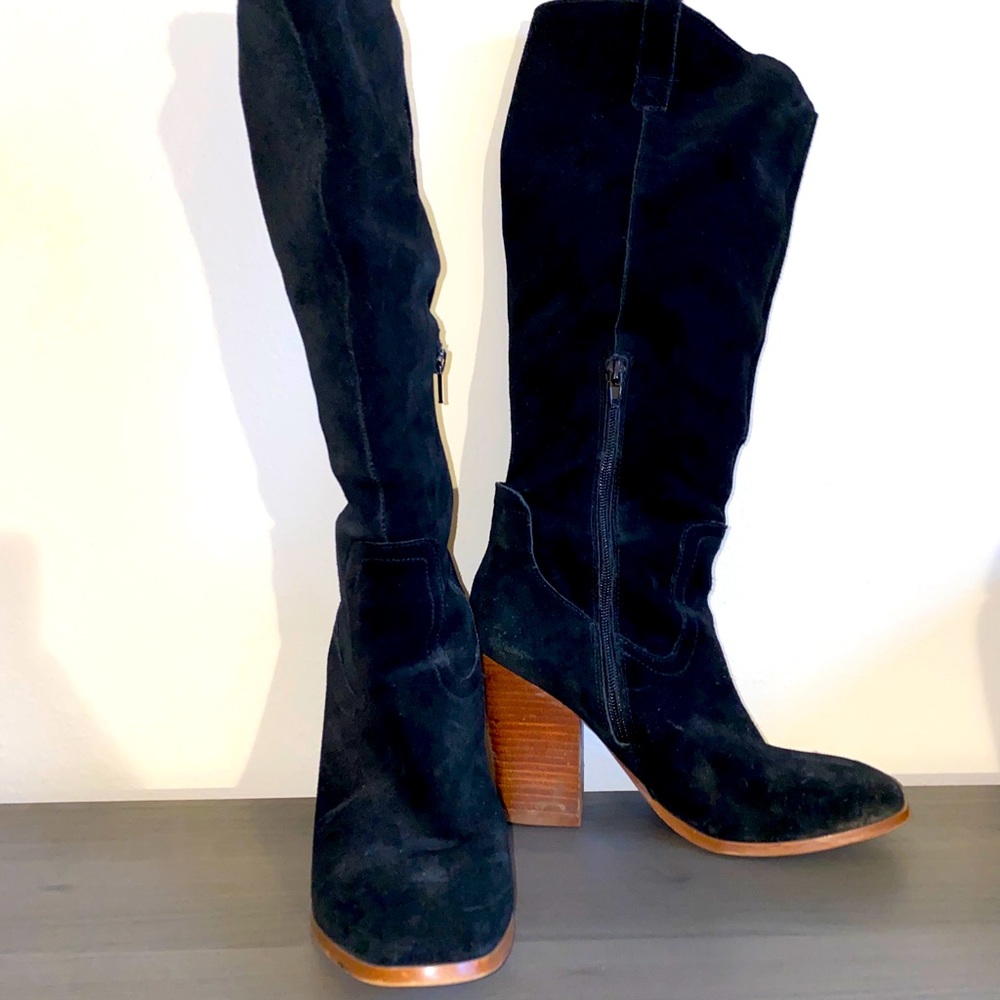 Tall black heeled boots